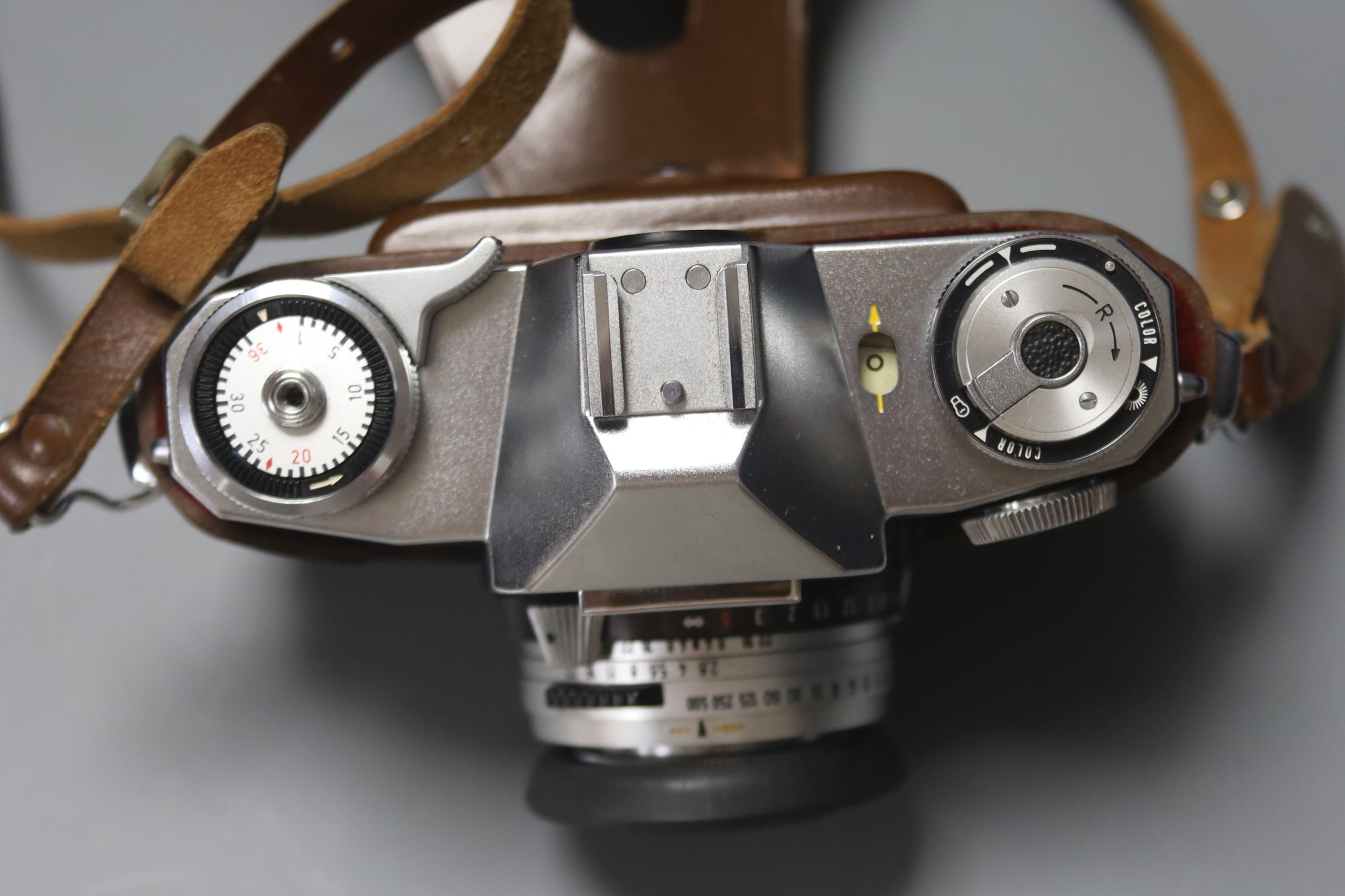 A French rosewood tea caddy, a tortoishell box, a camera and another box